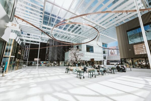 people sitting on chairs inside building
